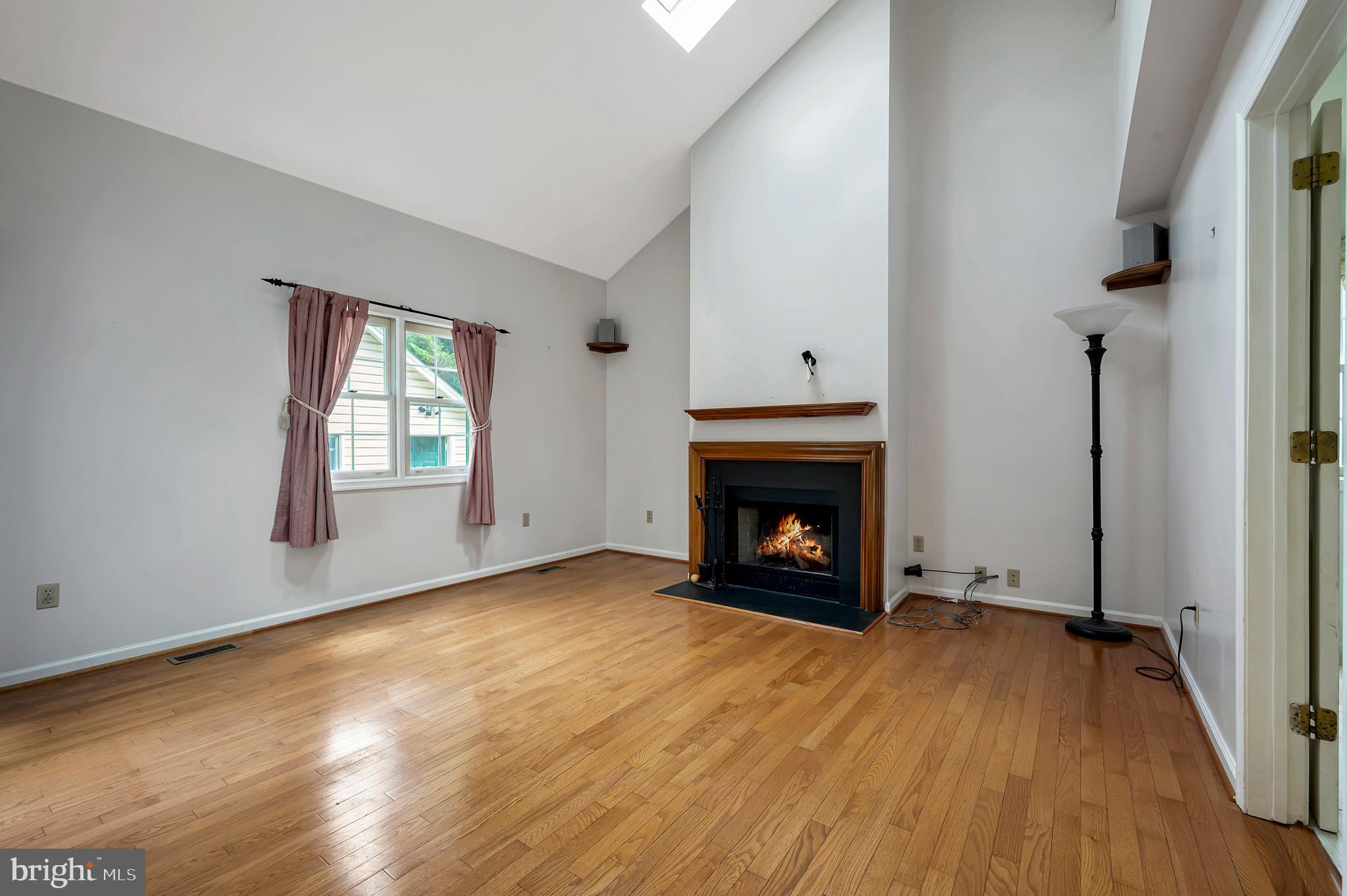 405 Aldon Road Claymont, DE 19703 - Photo 14 of 41 Family room with wood-burning fireplace