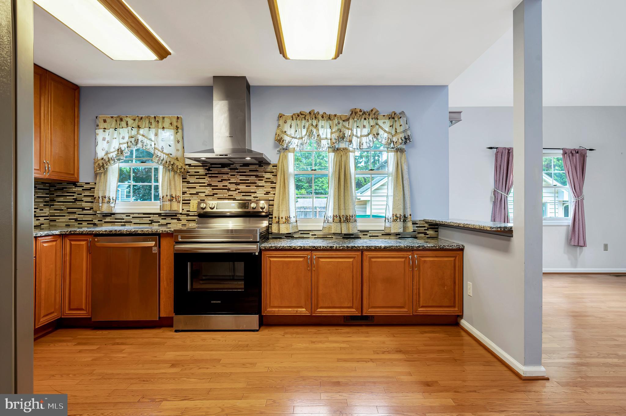 405 Aldon Road Claymont, DE 19703 - Photo 4 of 41 Bosch vented hood over stove