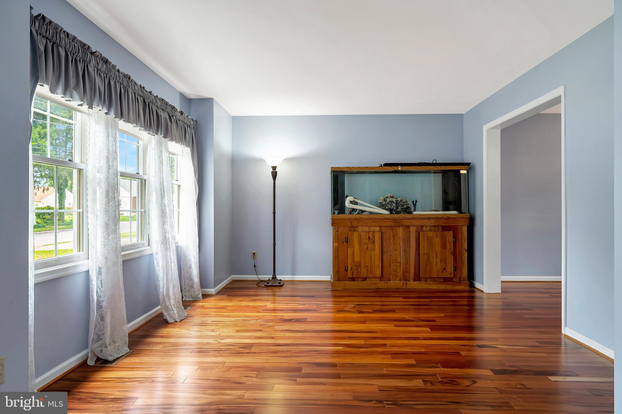 405 Aldon Road Claymont, DE 19703 - Photo 7 of 41 Bright living room with Brazilian tigerwood floor