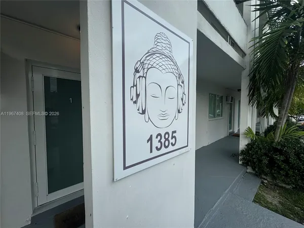 a sign that is on the side of a building