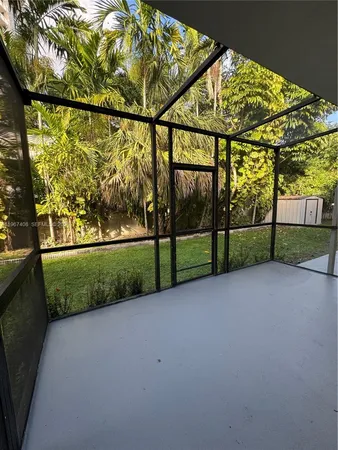 a view of outdoor space with deck area and garden
