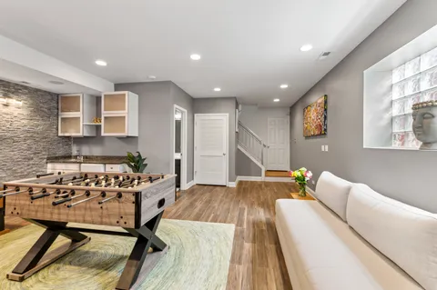 a living room with furniture and a table
