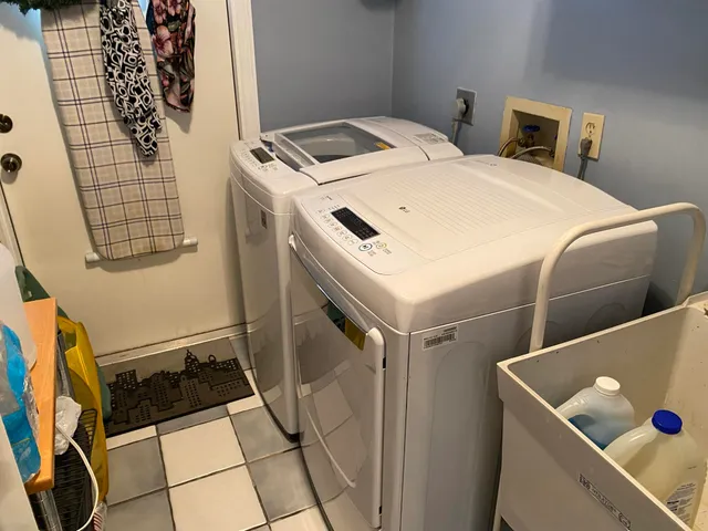 a utility room with dryer and washer