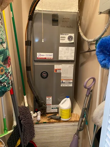 a picture of a bathroom with a sink and glass door