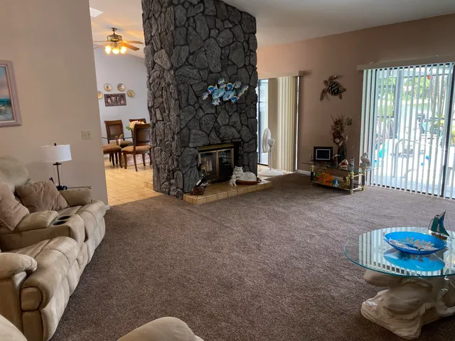 a living room with a fireplace