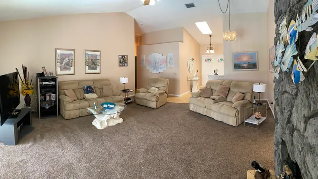 a bed sitting in a bedroom next to a wall