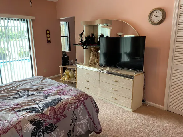 a view of backyard with cabin