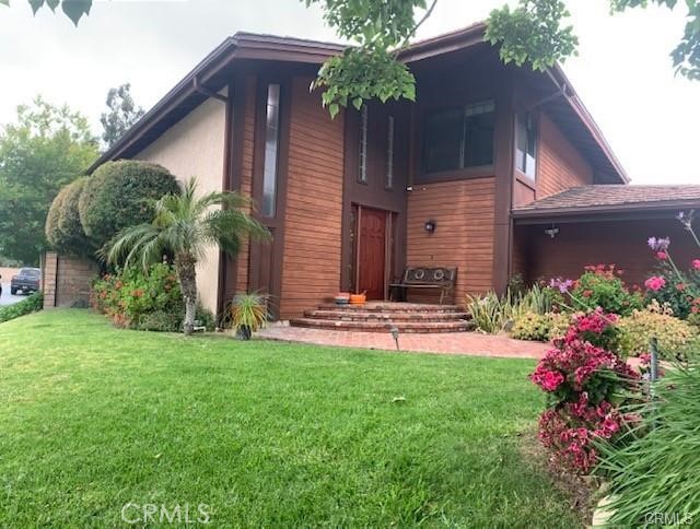 21897 Shenandoah Drive Lake Forest, CA 92630 - Photo 1 of 12 a view of a house with a yard and plants
