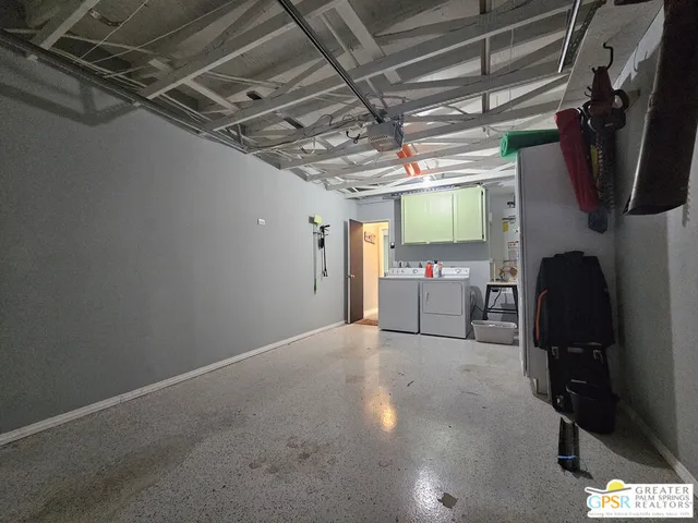 a room with lots of furniture and a window