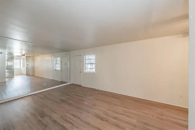 a kitchen with a stove a sink and a refrigerator