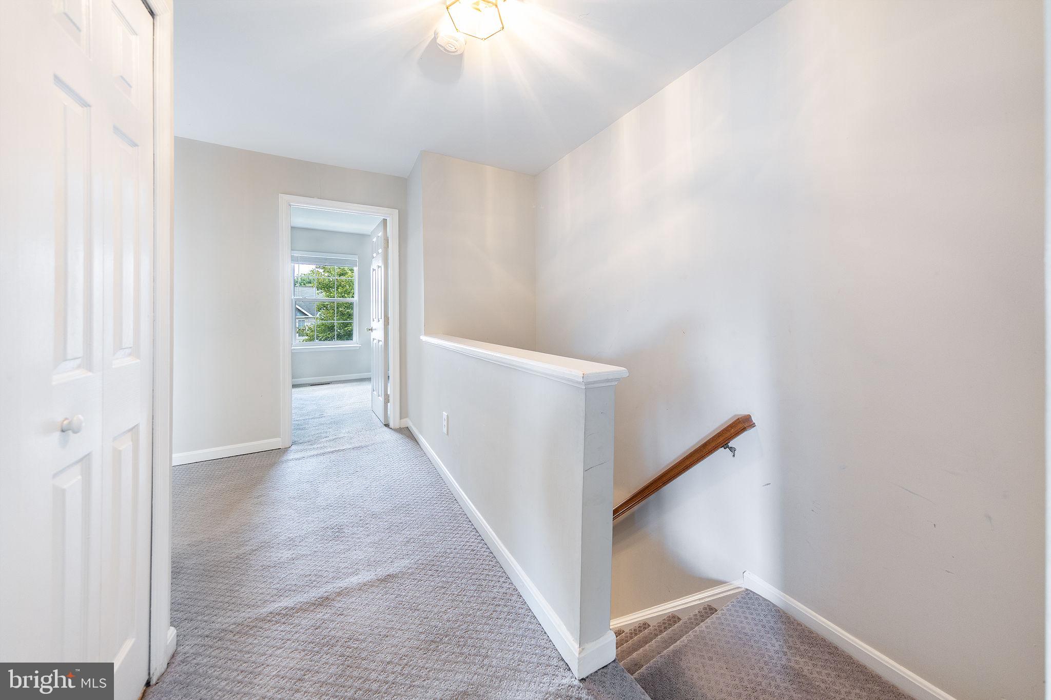 43115 Candlewick Square Leesburg, VA 20176 - Photo 13 of 31 a view of a hallway with front door