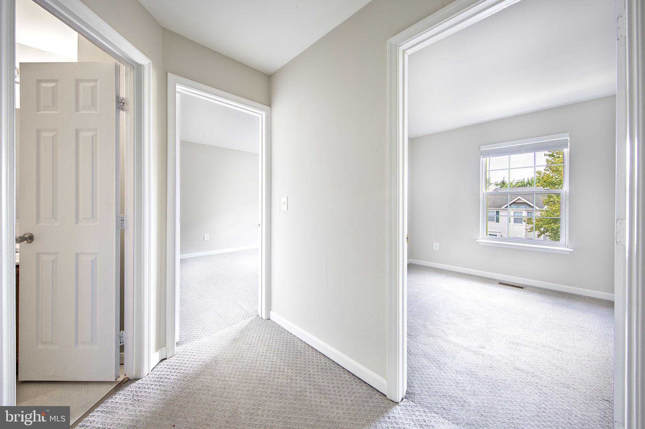 43115 Candlewick Square Leesburg, VA 20176 - Photo 14 of 31 an empty room with windows and outdoor view