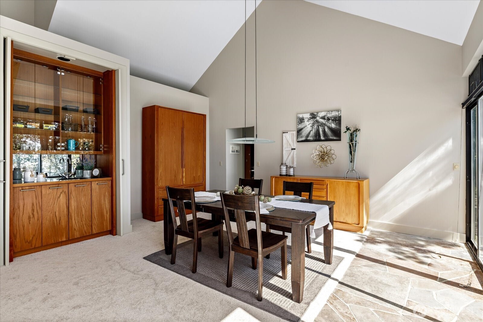 1912 East Hunskor Road Oak Harbor, WA 98277 - Photo 13 of 40 a view of a dining room with furniture window and outside view