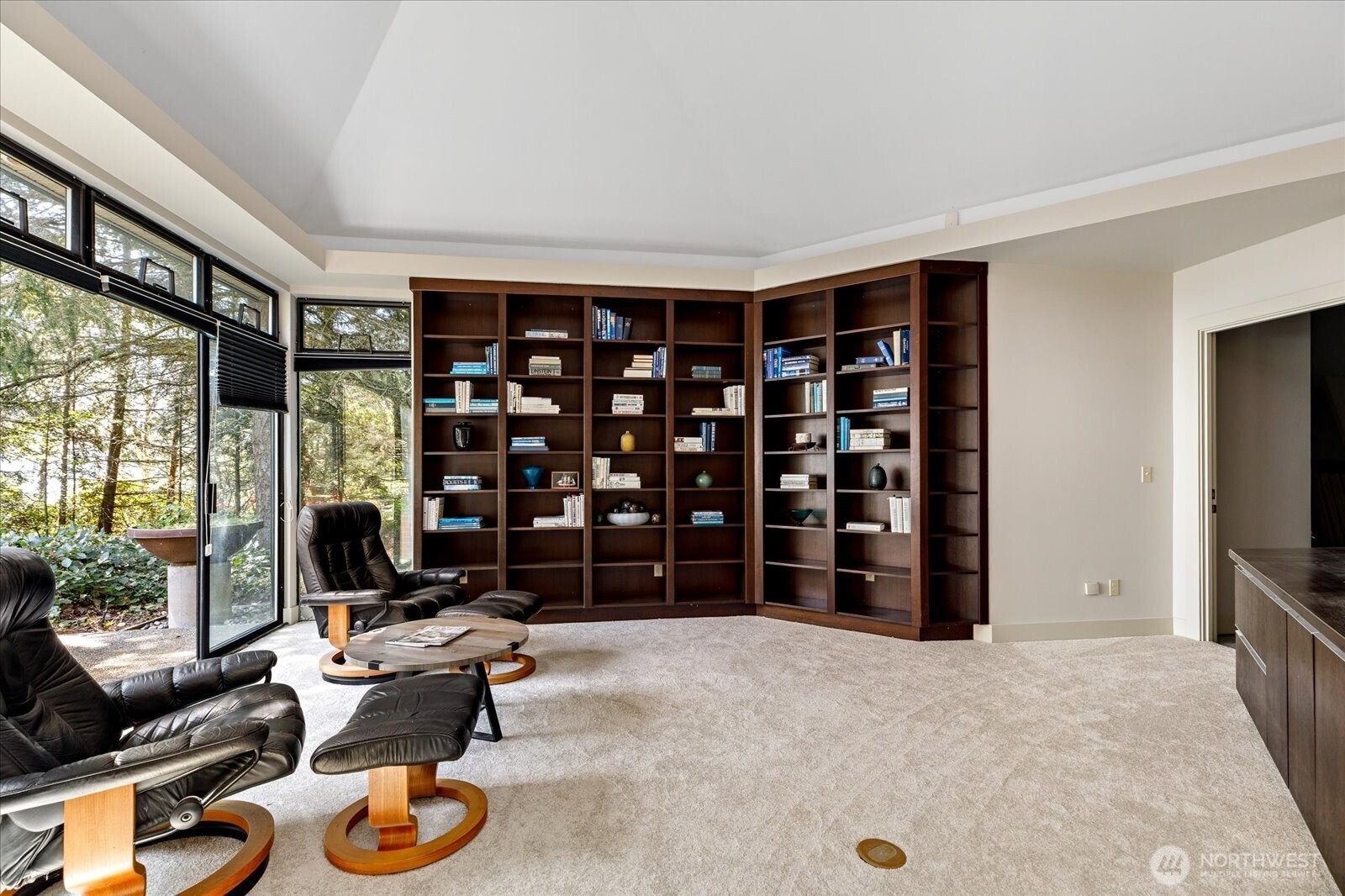 1912 East Hunskor Road Oak Harbor, WA 98277 - Photo 26 of 40 a living room with furniture a window and flat screen tv