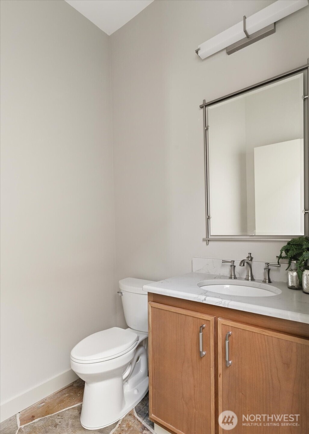1912 East Hunskor Road Oak Harbor, WA 98277 - Photo 28 of 40 a white toilet sitting next to a bathroom sink