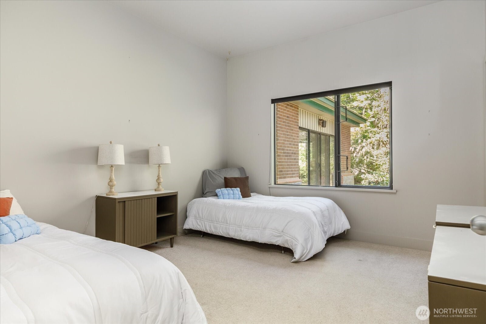 1912 East Hunskor Road Oak Harbor, WA 98277 - Photo 34 of 40 a bedroom with a bed and window