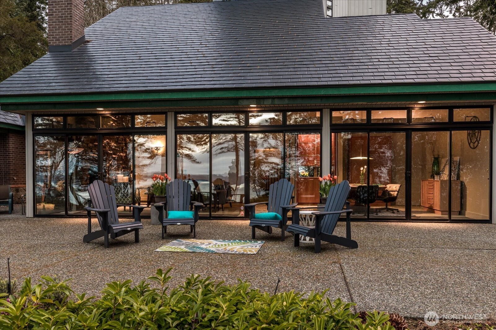 1912 East Hunskor Road Oak Harbor, WA 98277 - Photo 4 of 40 an outdoor view of a building with sitting area