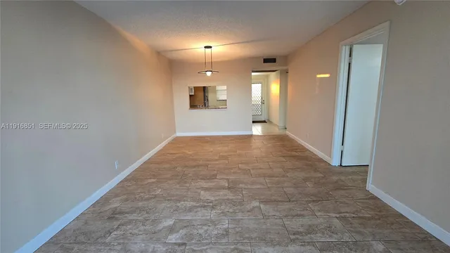 a view of a outdoor sitting area with a bench