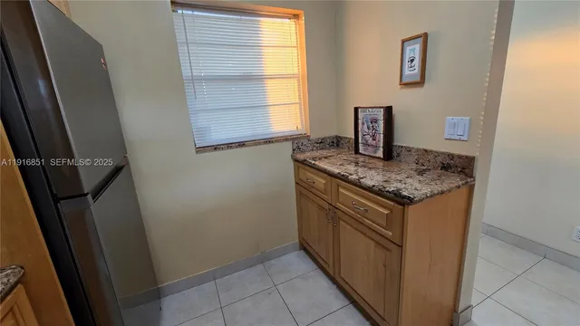 a utility room with window washer and dryer