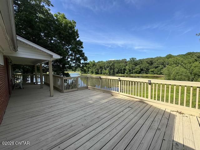 108 Springbrook Drive Jackson, TN 38305 - Photo 12 of 40 a view of a swimming pool with a patio