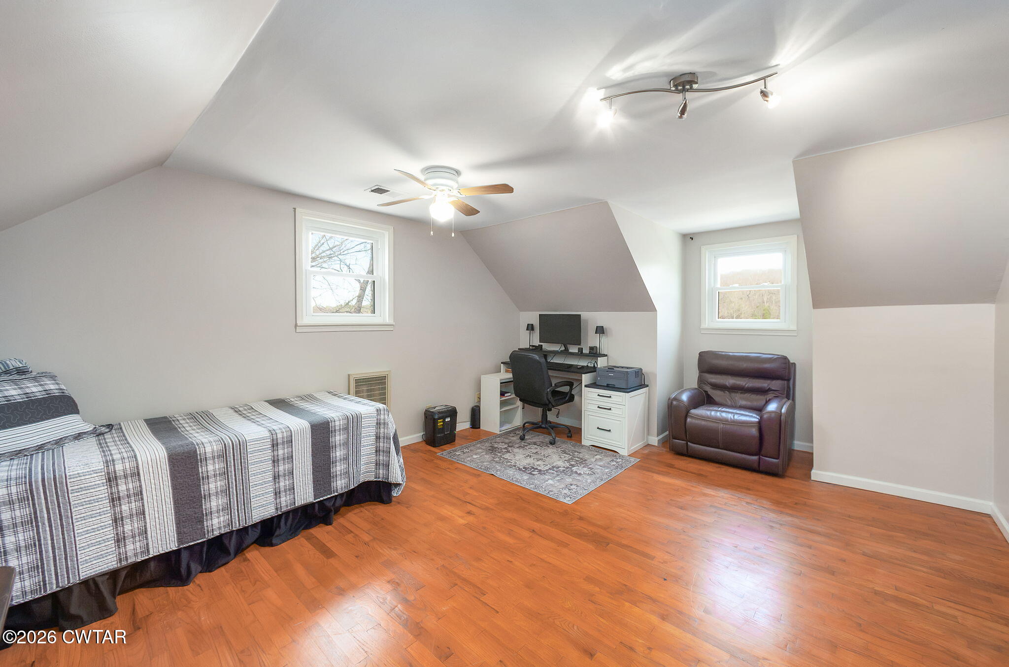108 Springbrook Drive Jackson, TN 38305 - Photo 16 of 40 a living room with furniture and a chandelier