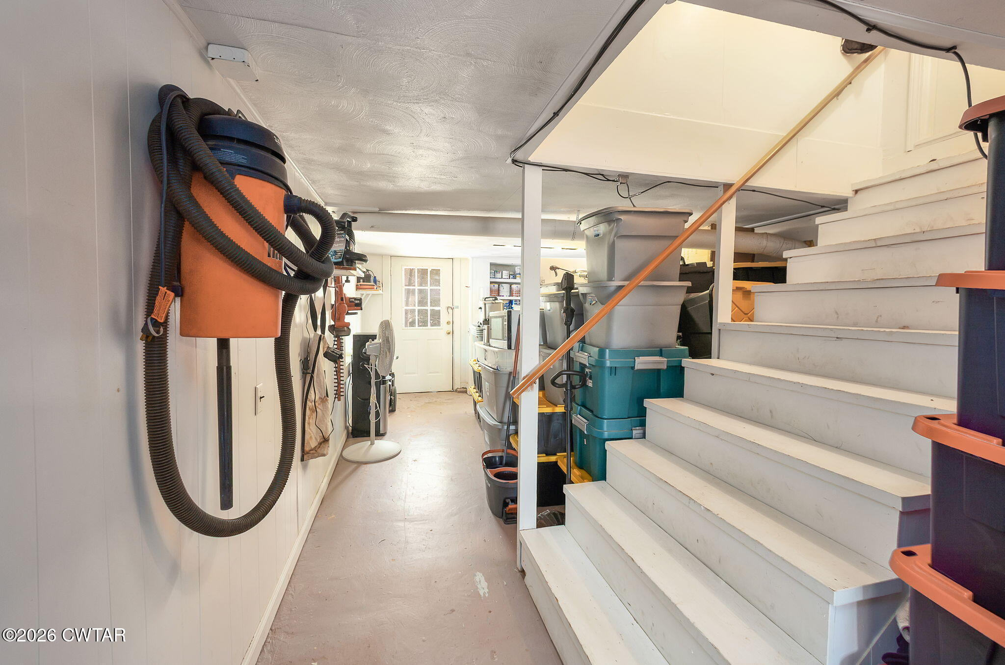 108 Springbrook Drive Jackson, TN 38305 - Photo 19 of 40 a view of a staircase with white walls and a stairs