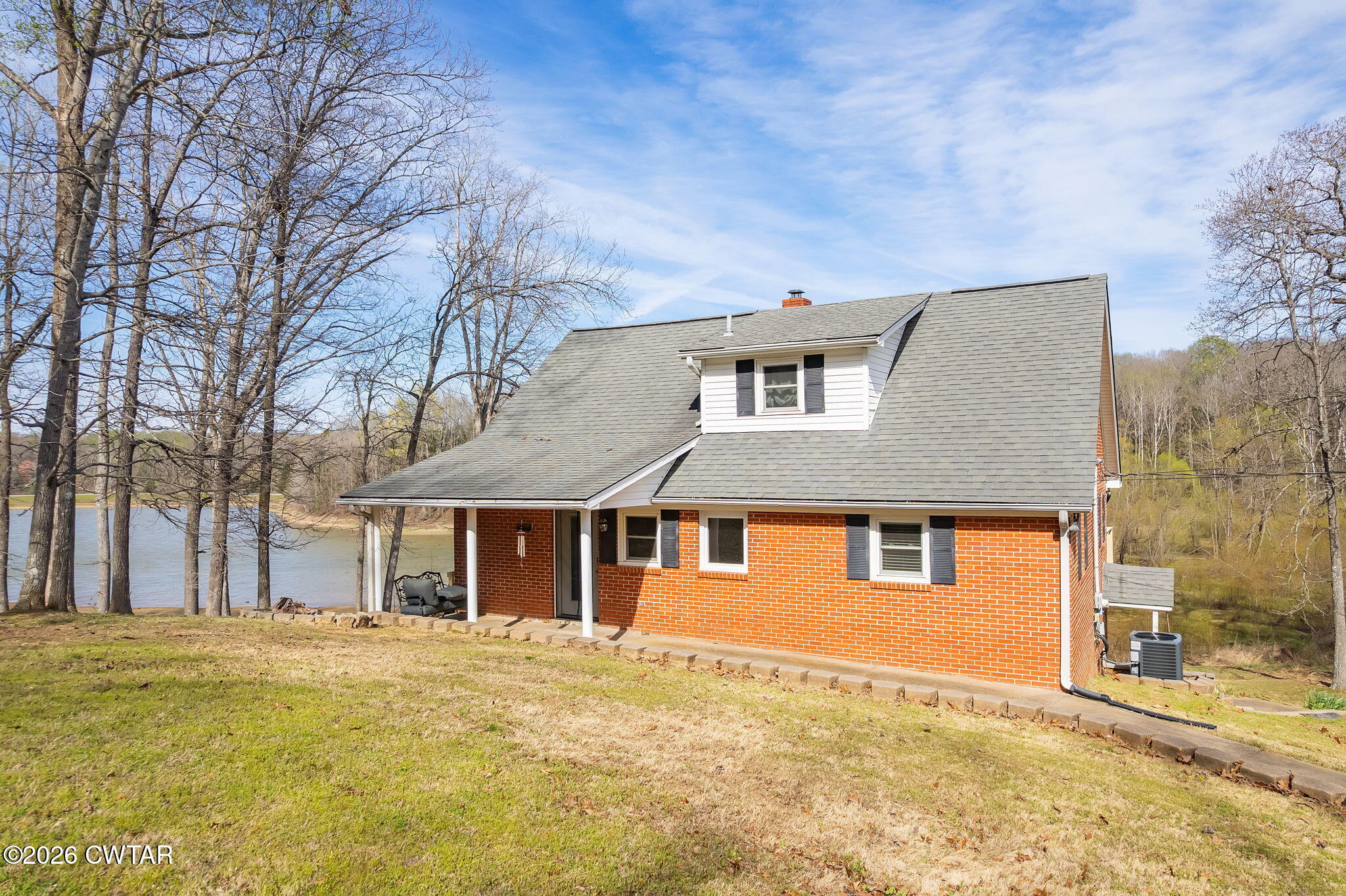 108 Springbrook Drive Jackson, TN 38305 - Photo 21 of 40 a front view of a house with a yard