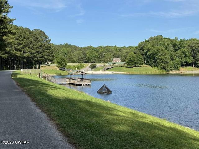 108 Springbrook Drive Jackson, TN 38305 - Photo 26 of 40 a view of a swimming pool and lake view