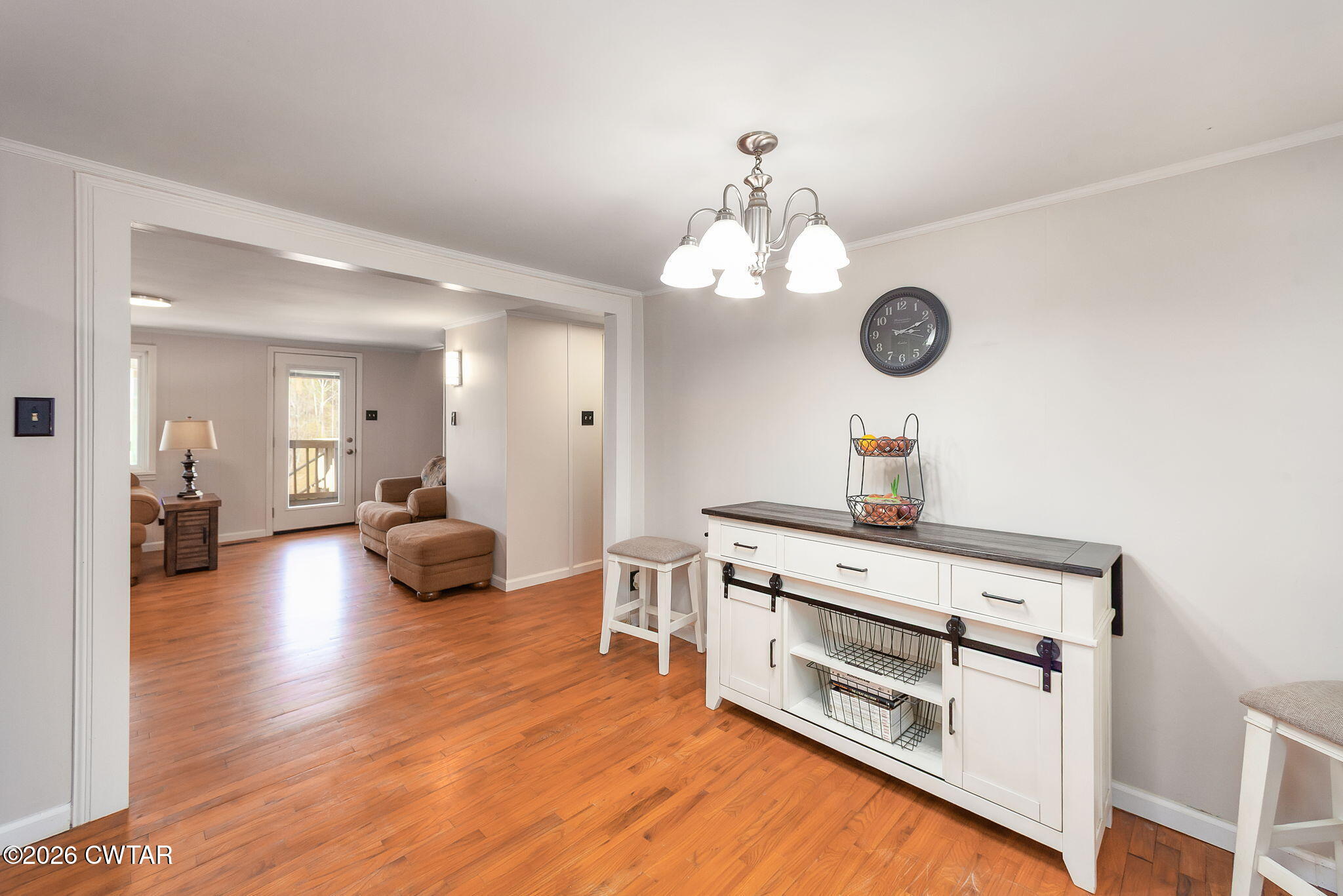 108 Springbrook Drive Jackson, TN 38305 - Photo 28 of 40 a view of a kitchen with stove and wooden floor