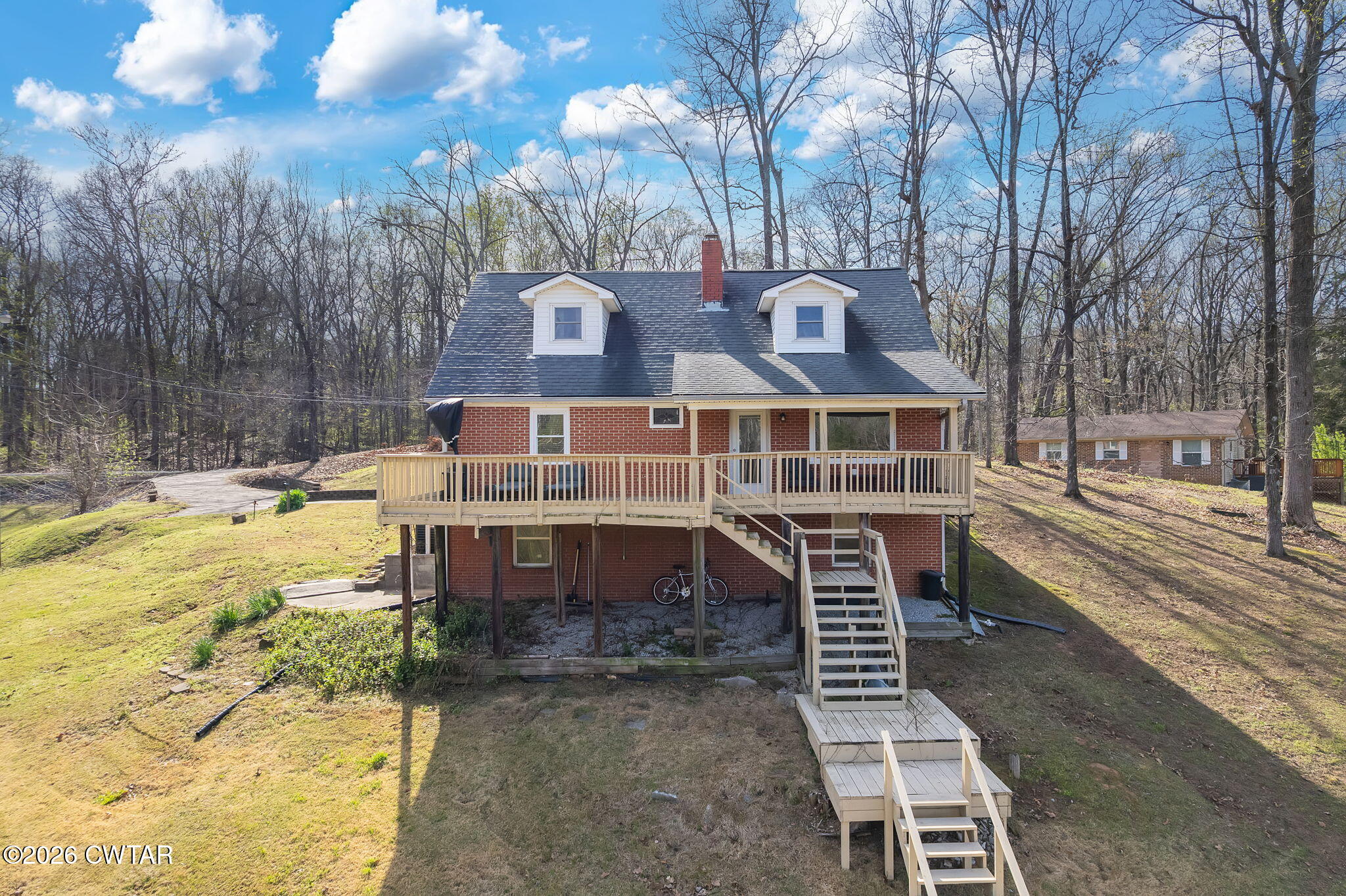 108 Springbrook Drive Jackson, TN 38305 - Photo 36 of 40 a view of a house with a yard