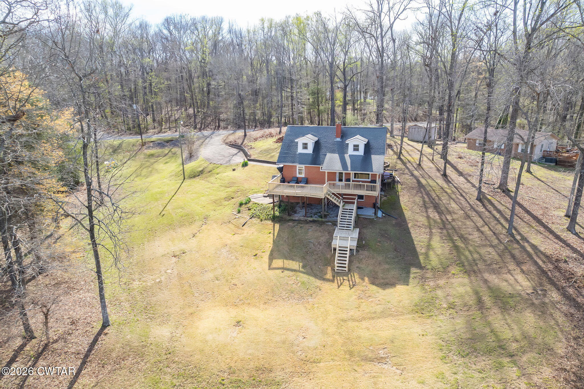 108 Springbrook Drive Jackson, TN 38305 - Photo 38 of 40 a view of a swimming pool with a patio
