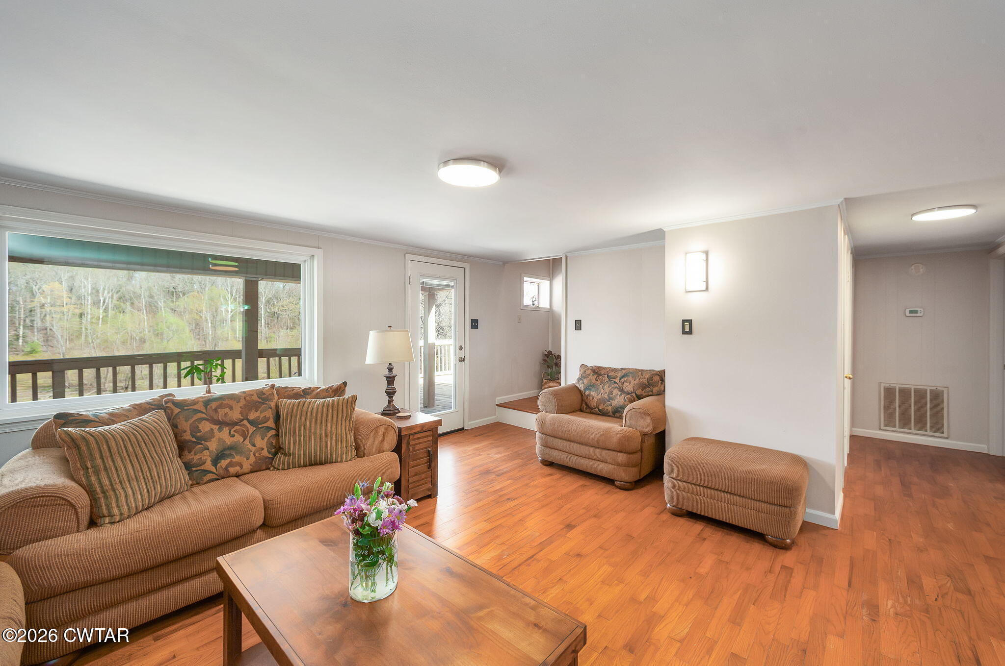 108 Springbrook Drive Jackson, TN 38305 - Photo 4 of 40 a living room with furniture and a large window