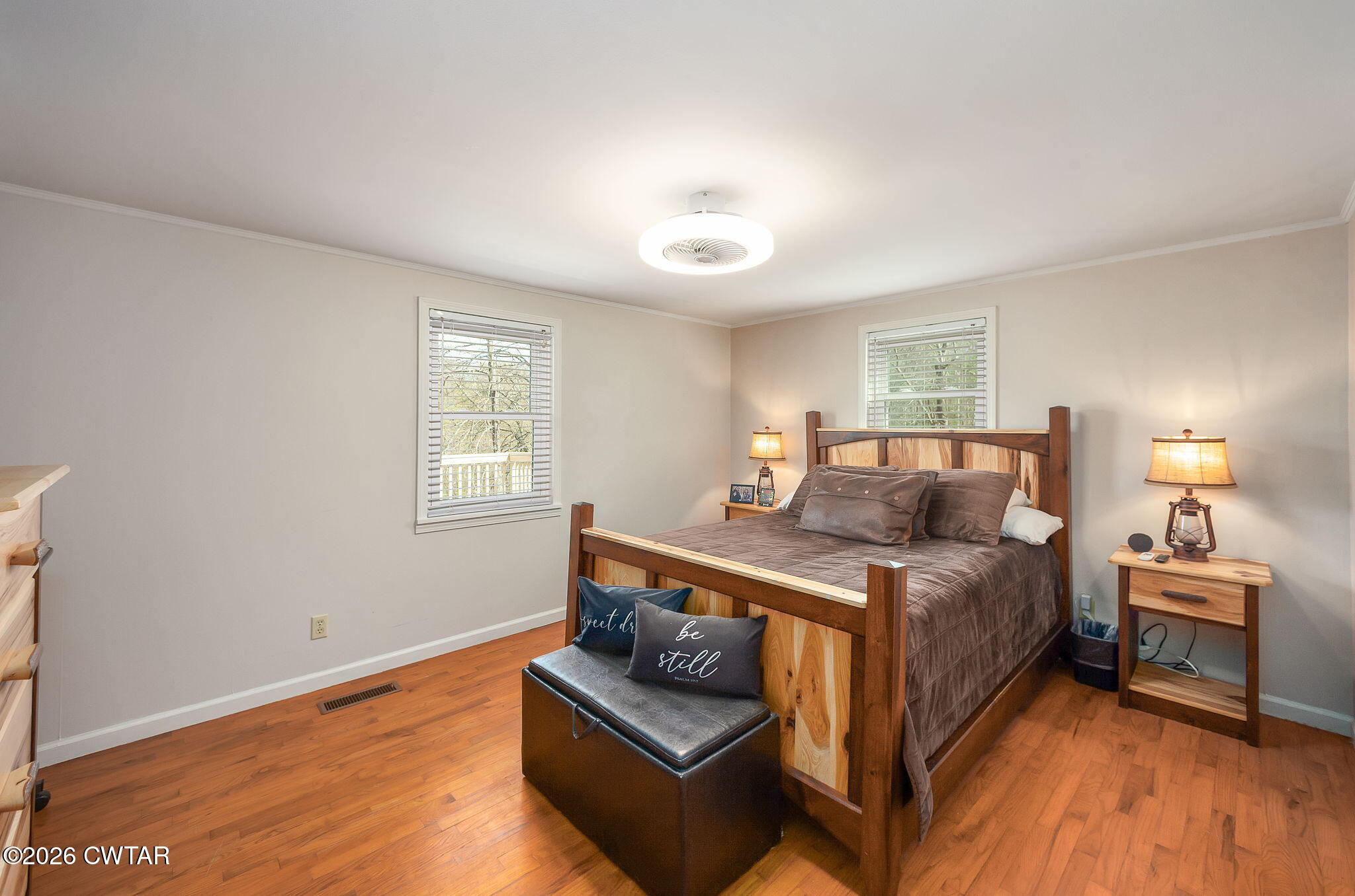 108 Springbrook Drive Jackson, TN 38305 - Photo 7 of 40 a bedroom with a bed and a couch