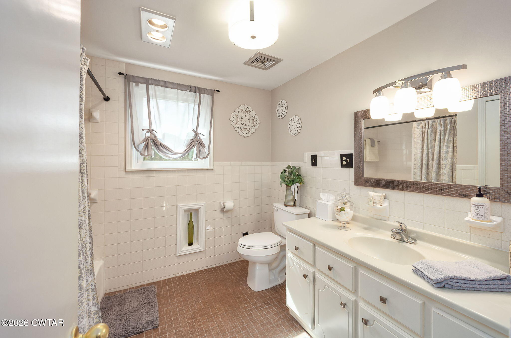 108 Springbrook Drive Jackson, TN 38305 - Photo 10 of 40 a bathroom with a granite countertop sink mirror and toilet