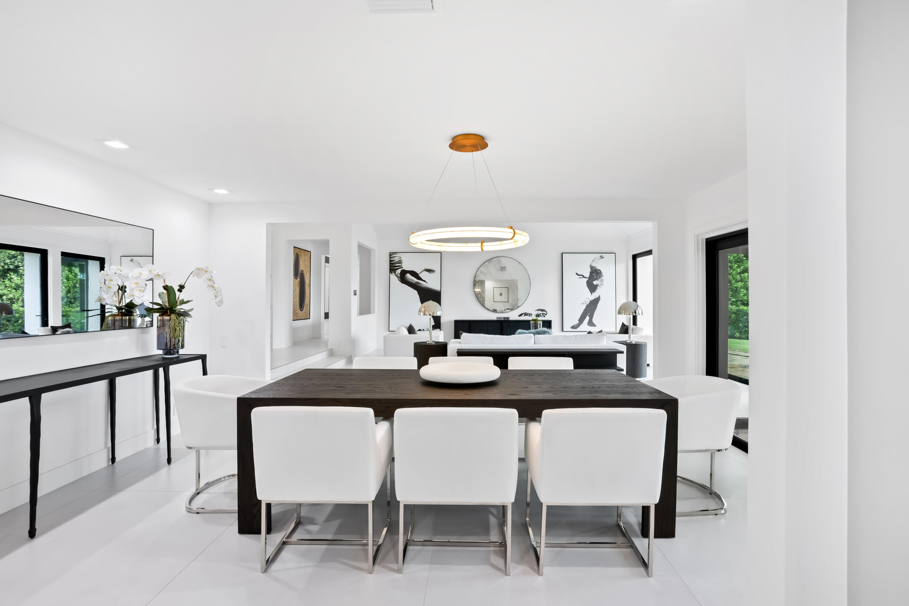 18743 Long Lake Drive Boca Raton, FL 33496 - Photo 15 of 84 a view of a dining room with furniture and a large window