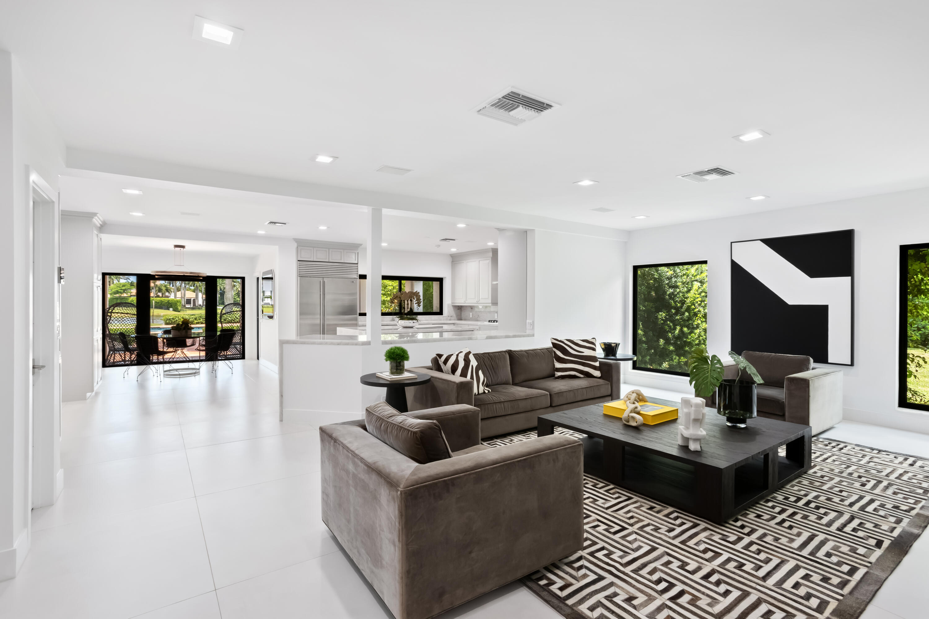 18743 Long Lake Drive Boca Raton, FL 33496 - Photo 23 of 84 a living room with furniture fireplace and rug