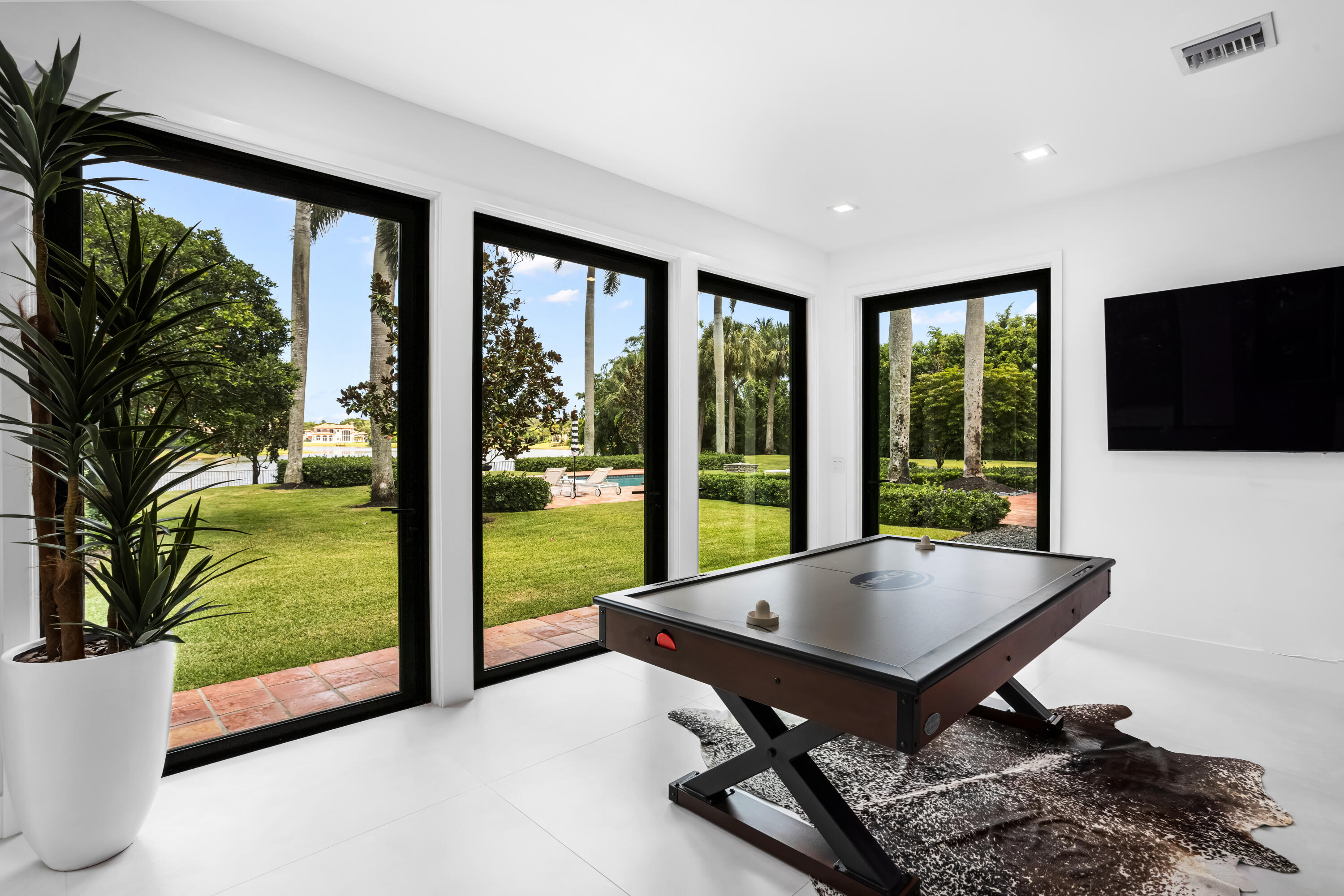 18743 Long Lake Drive Boca Raton, FL 33496 - Photo 29 of 84 a living room with hardwood floor and large window