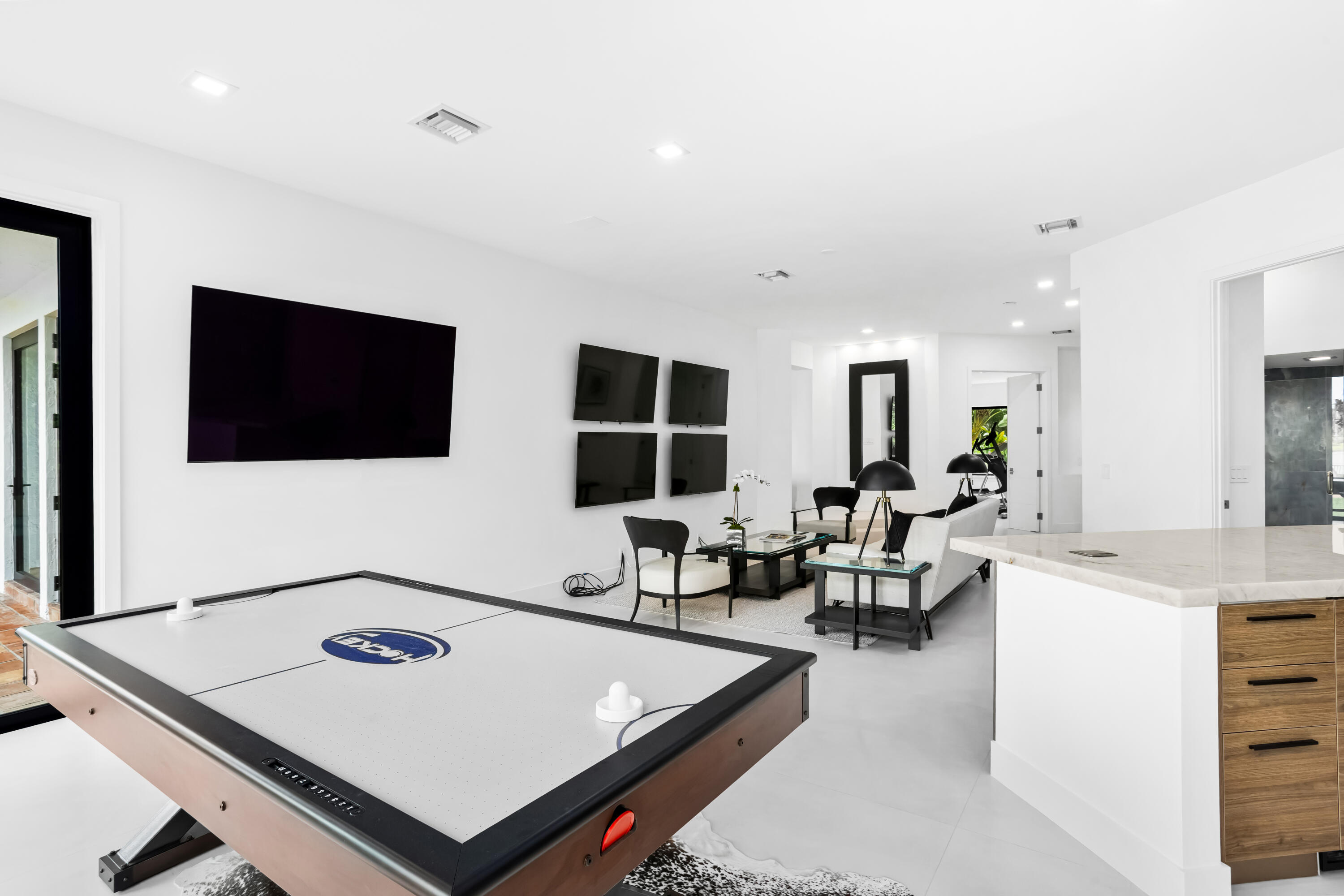 18743 Long Lake Drive Boca Raton, FL 33496 - Photo 30 of 84 a living room with furniture and a flat screen tv