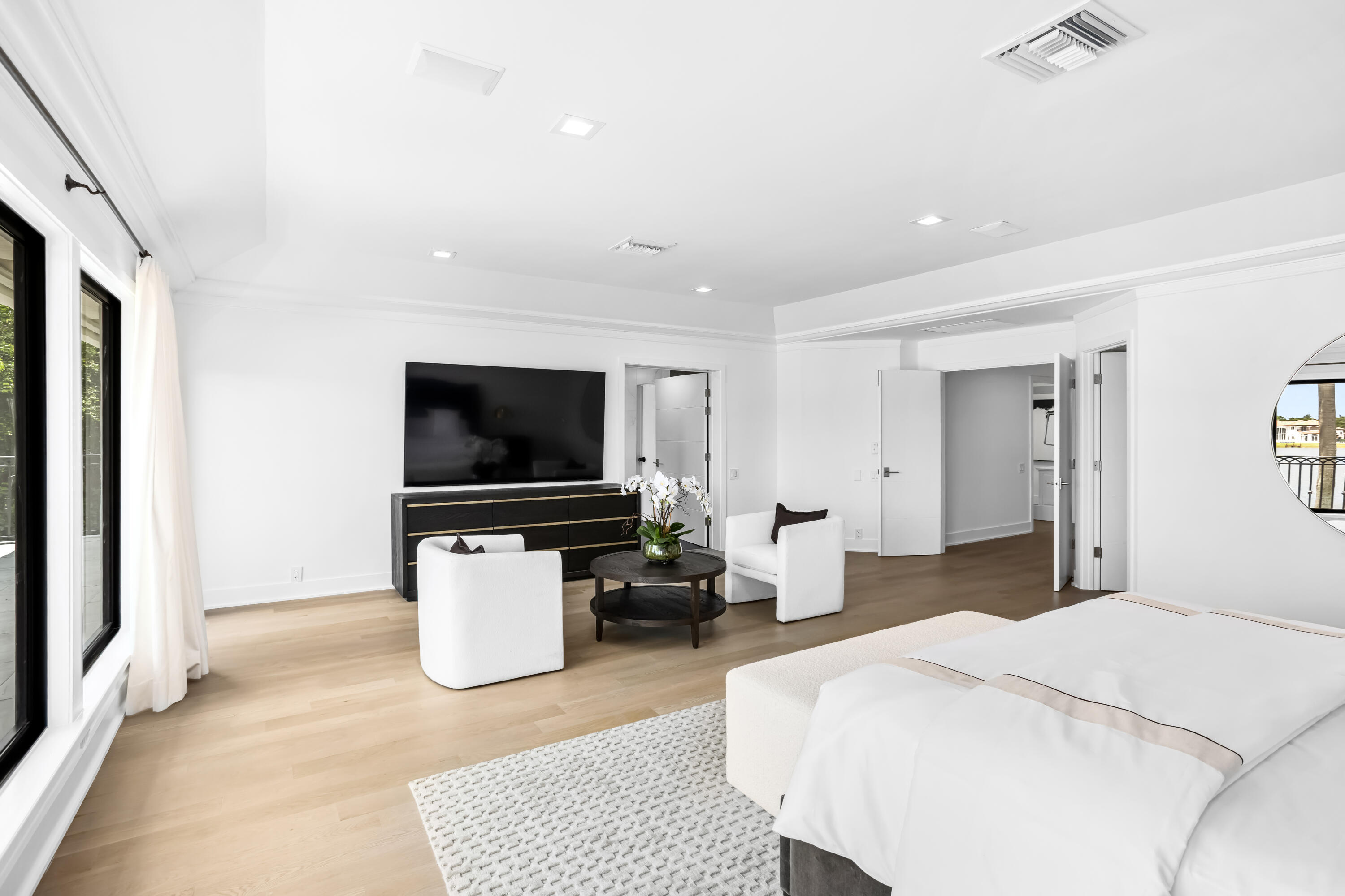 18743 Long Lake Drive Boca Raton, FL 33496 - Photo 43 of 84 a bedroom with furniture and a flat screen tv