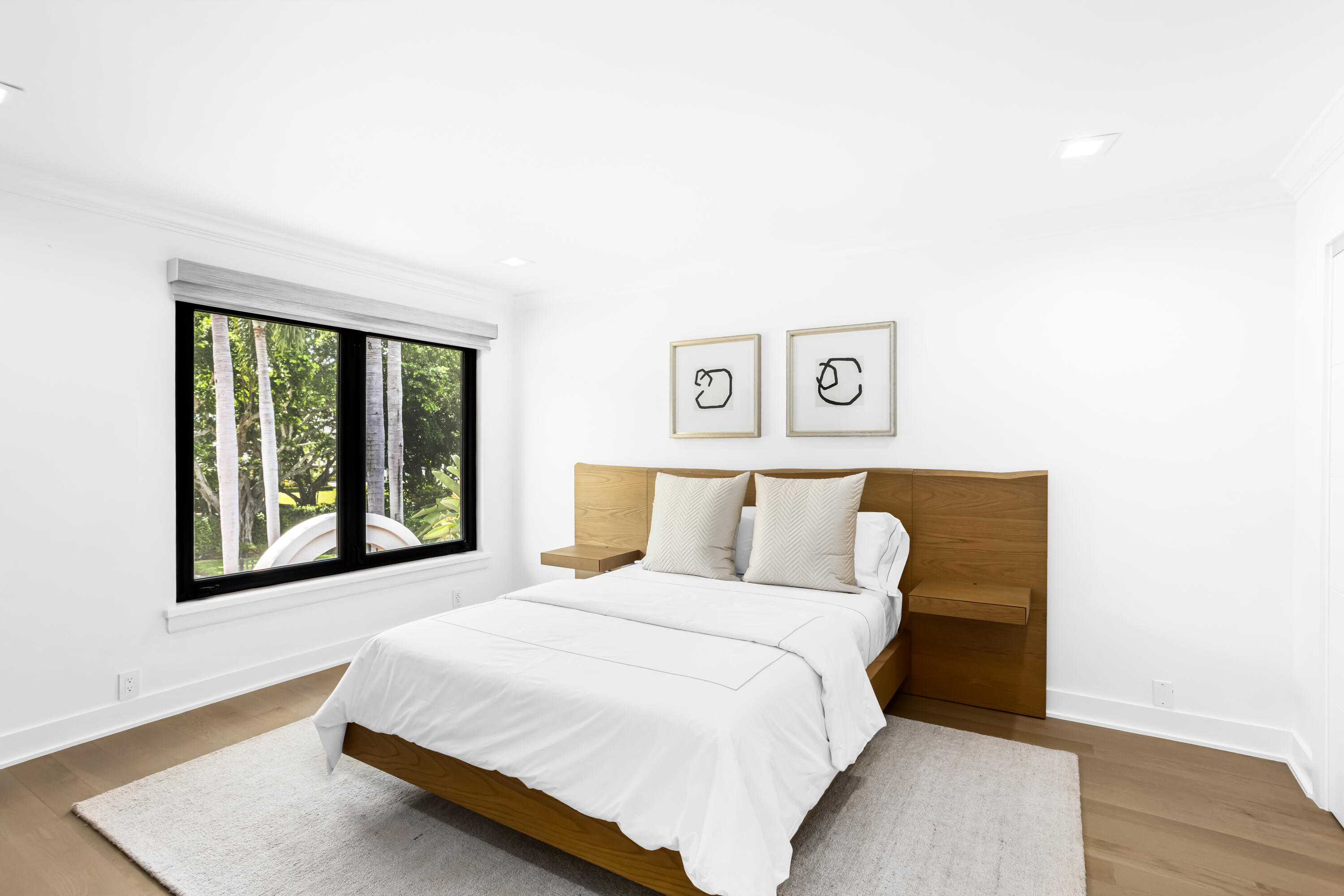 18743 Long Lake Drive Boca Raton, FL 33496 - Photo 51 of 84 a bedroom with a large bed and a window