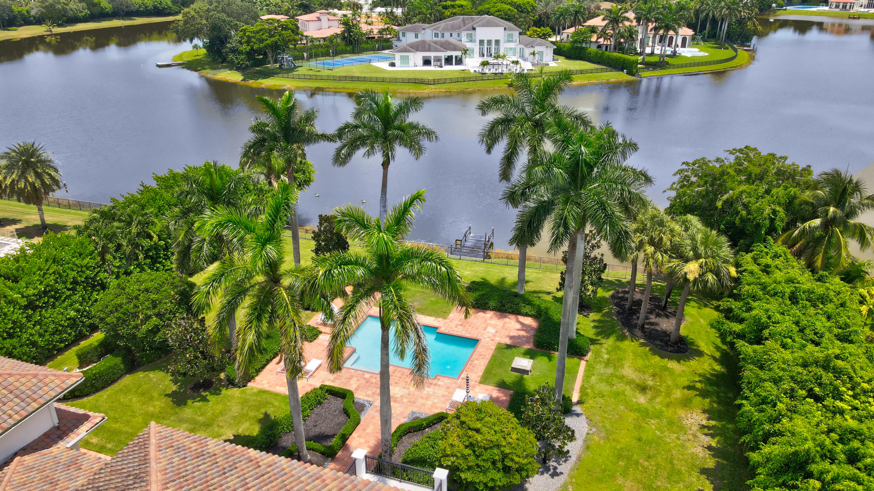 18743 Long Lake Drive Boca Raton, FL 33496 - Photo 70 of 84 an aerial view of a house with a yard and lake view