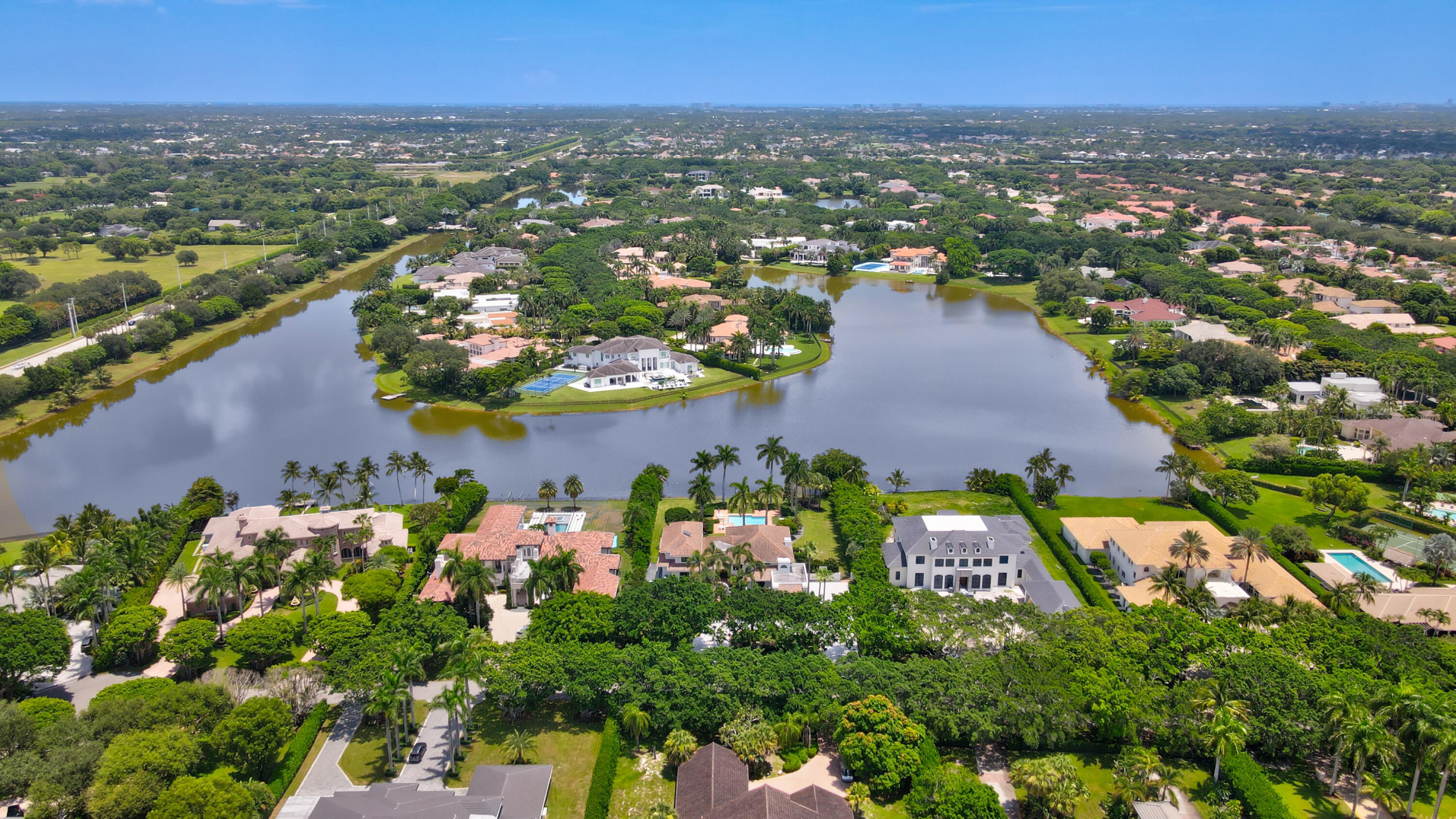 18743 Long Lake Drive Boca Raton, FL 33496 - Photo 72 of 84 an aerial view of residential houses with outdoor space and trees