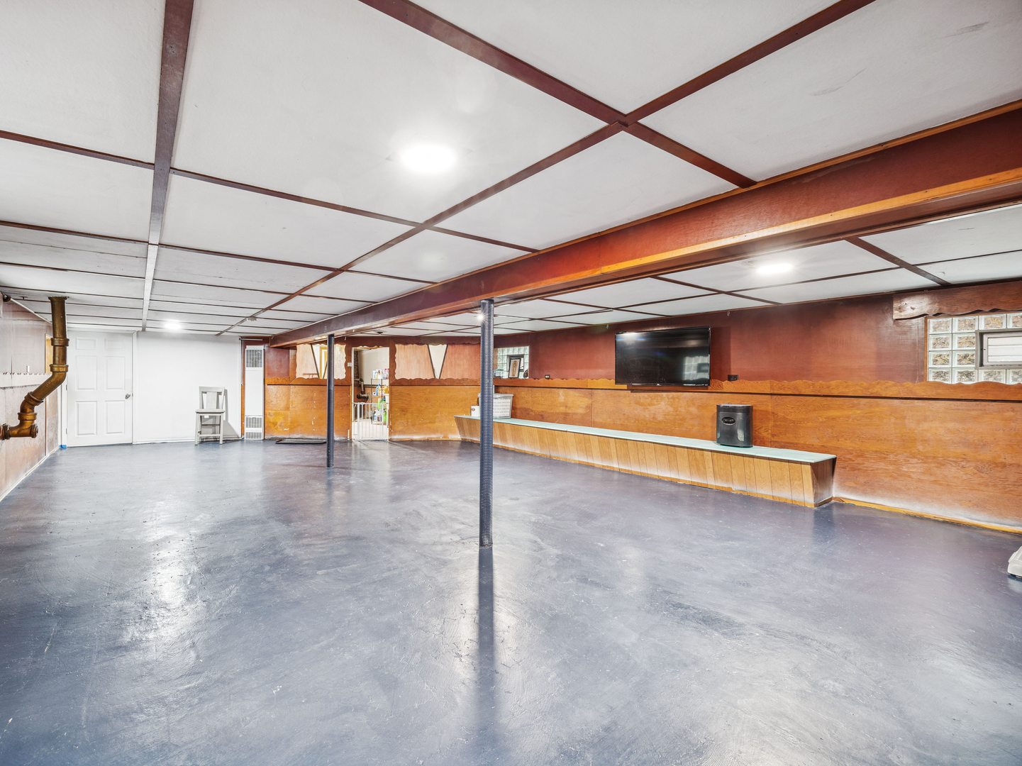 3905 West 68th Place Chicago, IL 60629 - Photo 17 of 27 a view of a room with wooden floor