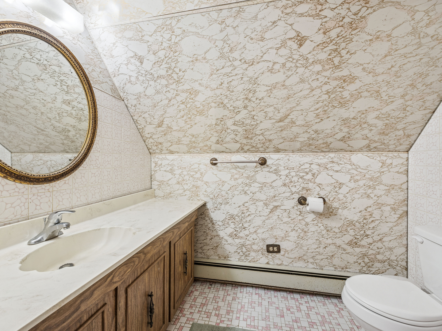 3905 West 68th Place Chicago, IL 60629 - Photo 19 of 27 a bathroom with a sink and a mirror
