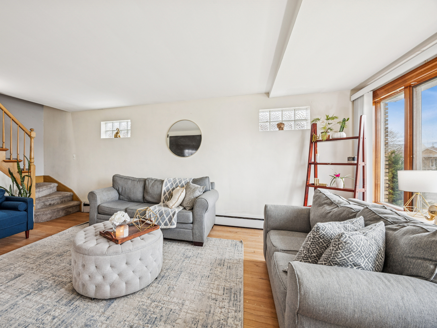 3905 West 68th Place Chicago, IL 60629 - Photo 3 of 27 a living room with furniture and a fireplace