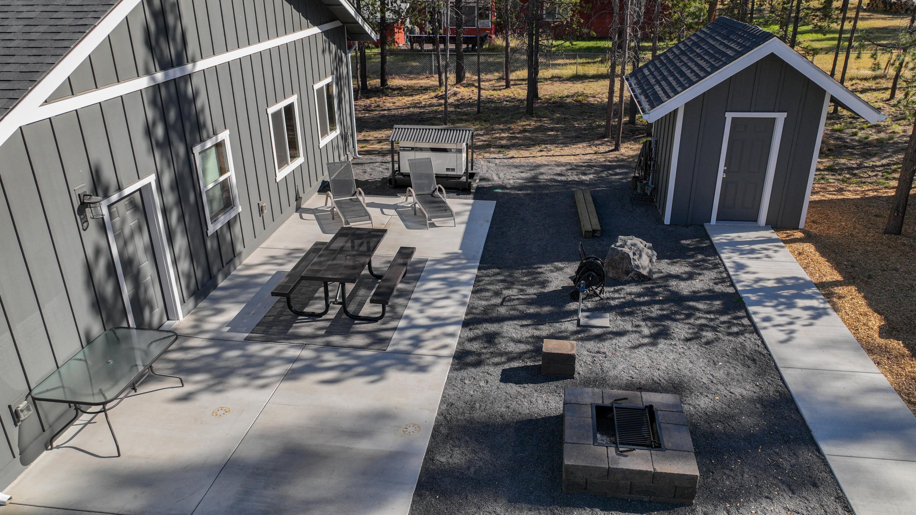 17201 Bakersfield Road Bend, OR 97707 - Photo 44 of 57 Firepit and well house