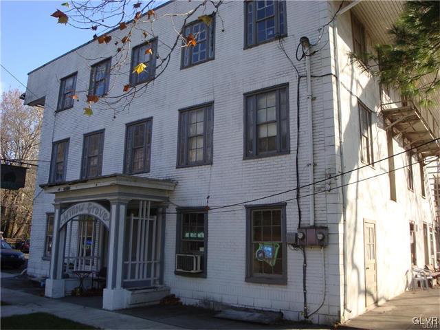 a view of building with a street