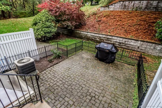 a garden view with a seating space