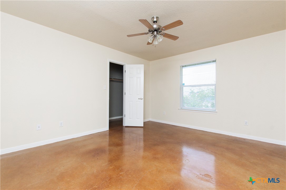 211 West Arlo Road, Unit A Harker Heights, TX 76548 - Photo 15 of 19 an empty room with a window and a fan