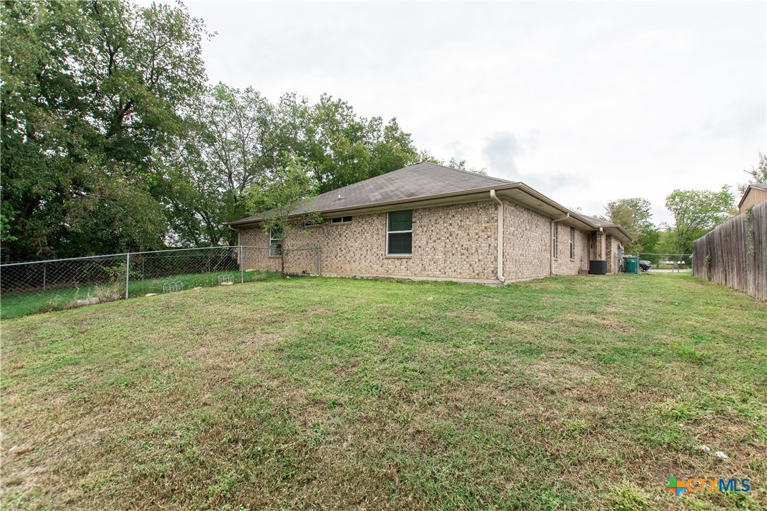 211 West Arlo Road, Unit A Harker Heights, TX 76548 - Photo 19 of 19 a house with a garden
